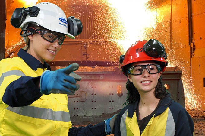 Two students wearing PPE equipment at Port Kembla Steelworks