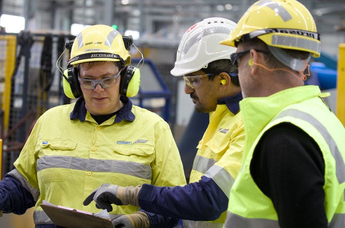 BlueScope employees in PPE  equipment