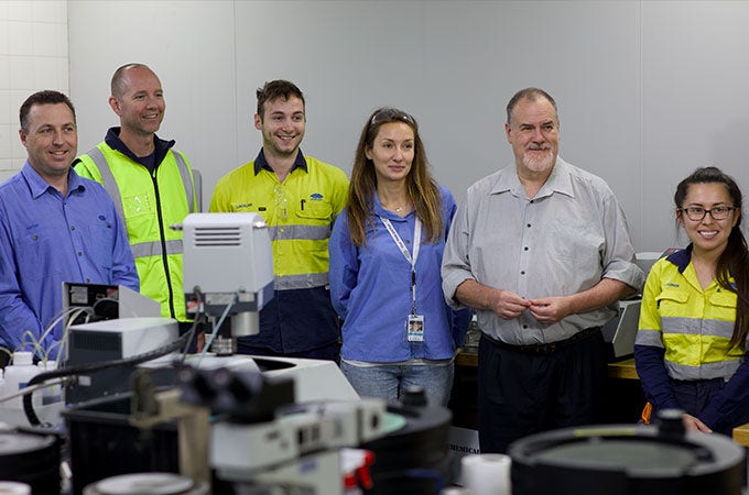 BlueScope employees smiling at the camera