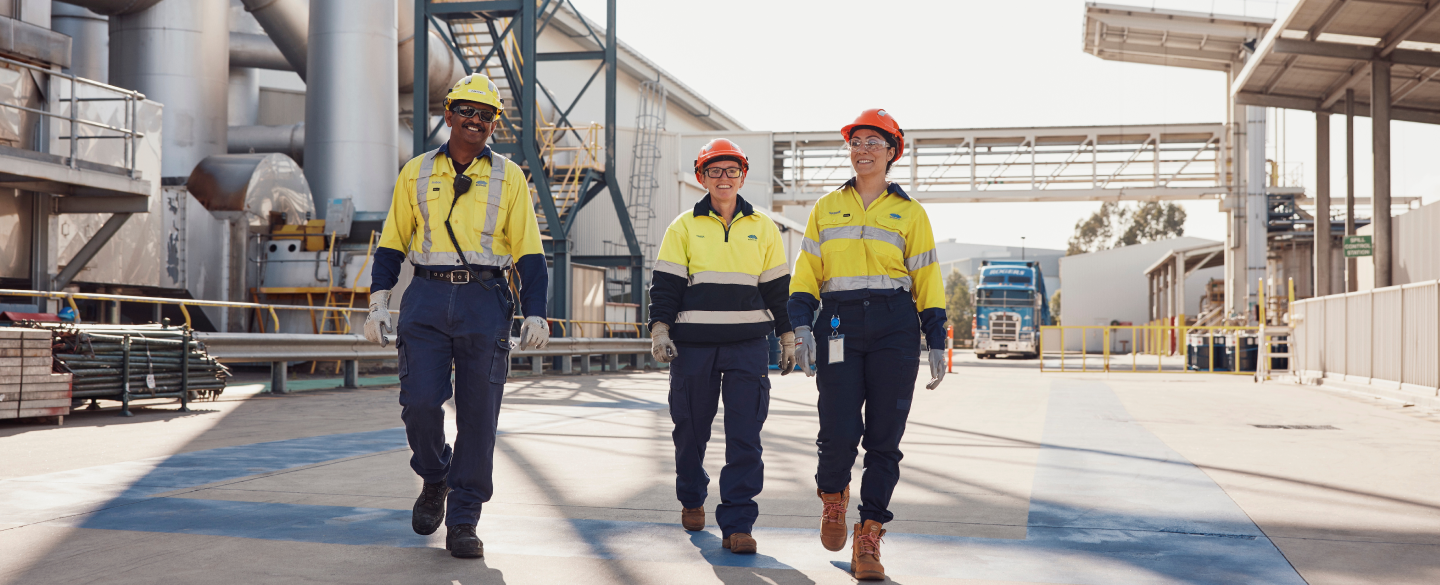 Two BlueScope employees atop Western Sydney Service Centre roof